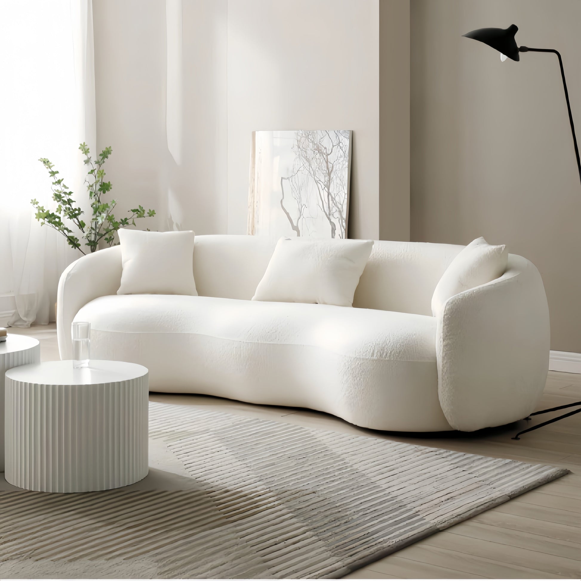 Fleece 3-seater sofa in beige - side angle view in Dubai living room